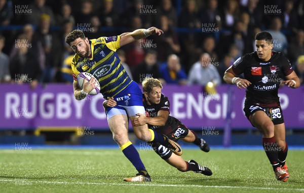 131017 - Cardiff Blues v Lyon - European Rugby Challenge Cup - Alex Cuthbert of Cardiff Blues is tackled by Piero Dominguez of Lyon