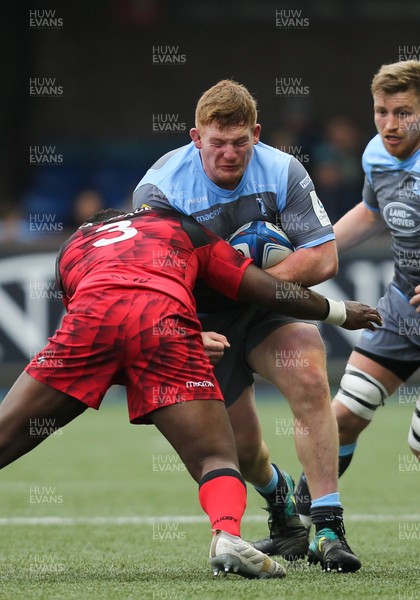 190119 -  Cardiff Blues v Lyon, European Champions Cup - Rhys Carre of Cardiff Blues takes on Kevin Yameogo of Lyon