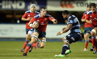 011114 - Cardiff Blues v Munster - Guiness PRO12 -Robin Copeland of Munster takes on Manoa Vosawai of Cardiff Blues