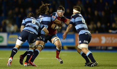 011114 - Cardiff Blues v Munster - Guiness PRO12 -Robin Copeland of Munster is tackled by Josh Turnbull, Josh Navidi and Jarrad Hoeata of Cardiff Blues