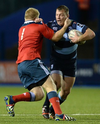 011114 - Cardiff Blues v Munster - Guiness PRO12 -Matthew Rees of Cardiff Blues is tackled by John Ryan of Munster