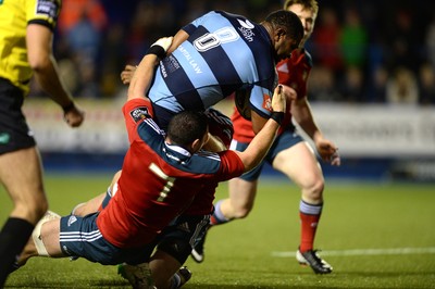 011114 - Cardiff Blues v Munster - Guiness PRO12 -Manoa Vosawai of Cardiff Blues beats tackle by Paddy Butler of Munster to score try