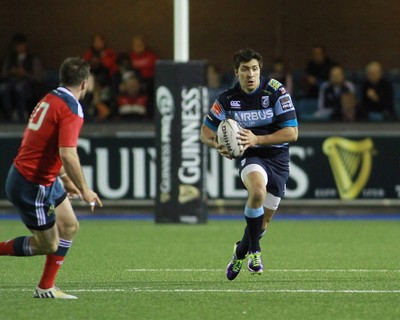 011114 - Cardiff Blues v Munster - GuinnessPro12 -Lucas Gonzalez Amorosino of The Blues takes on JJ Hanrahan of Munster