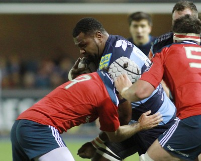 011114 - Cardiff Blues v Munster - GuinnessPro12 -Manoa Vosawai of The Blues is tackled by Duncan Williams of Munster 