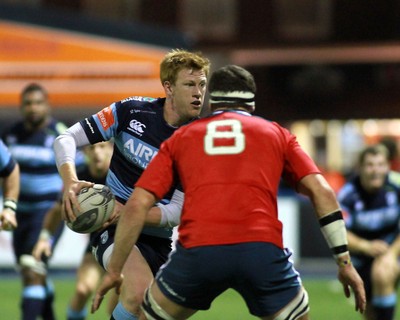 011114 - Cardiff Blues v Munster - GuinnessPro12 -Rhys Patchell of The Blues takes on Robin Copeland of Munster