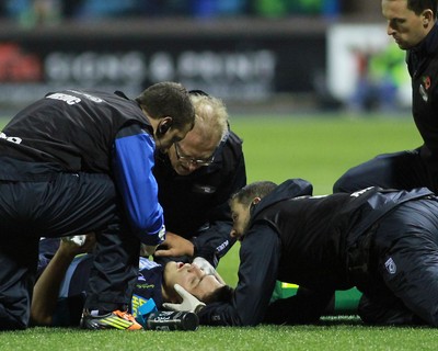 011114 - Cardiff Blues v Munster - GuinnessPro12 -Lucas Gonzalez Amorosinoi of The Blues receives treatment