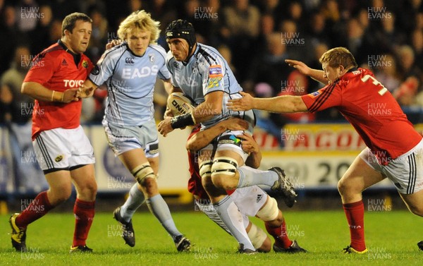 021112 - Cardiff Blues v Munster - RaboDirect PRO12 -Lou Reed of Cardiff Blues is tackled by Dave Foley of Munster