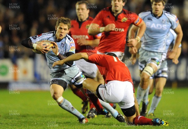 021112 - Cardiff Blues v Munster - RaboDirect PRO12 -Tom Williams of Cardiff Blues takes on Doug Howlett of Munster