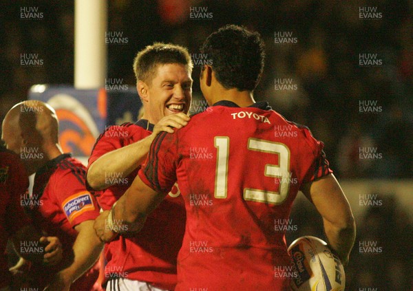 021112 Cardiff Blues v Munster - RaboDirect PRO 12 -Munster's Ronan O'Gara congratulates try scorer Casey Laulala 