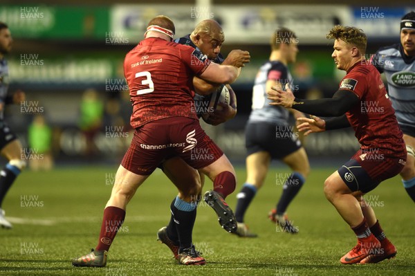 170218 - Cardiff Blues v Munster - Guinness PRO14 - Taufa'ao Filise of Cardiff Blues is tackled by John Ryan of Munster