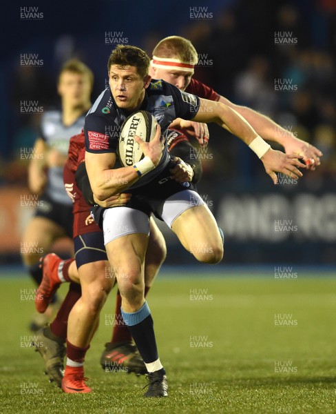 170218 - Cardiff Blues v Munster - Guinness PRO14 - Lloyd Williams of Cardiff Blues is tackled by Chris Cloete of Munster