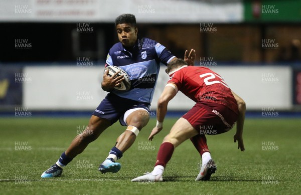210918 - Cardiff Blues v Munster, Guinness PRO14 - Willis Halaholo of Cardiff Blues takes Shane Daly of Munster