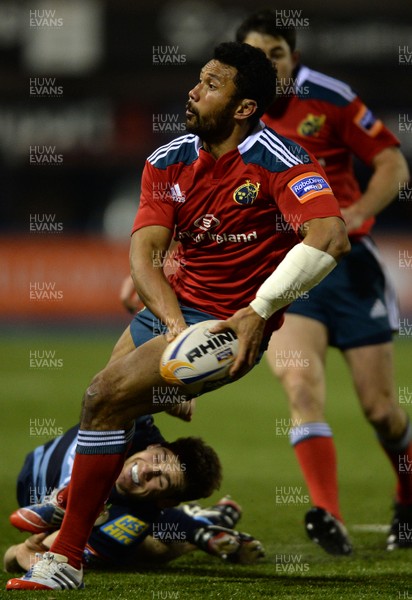 231113 - Cardiff Blues v Munster - RaboDirect PRO12 -Casey Laulala of Munster is tackled by Gavin Evans of Cardiff Blues