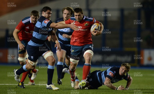 231113 - Cardiff Blues v Munster - RaboDirect PRO12 -CJ Stander of Munster holds off Andries Pretorius of Cardiff Blues