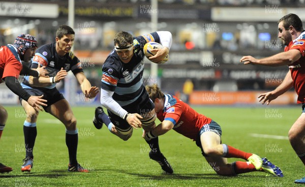 231113 - Cardiff Blues v Munster - RaboDirect PRO12 -Robin Copeland of Cardiff Blues is tackled by Cathal Sheridan of Munster