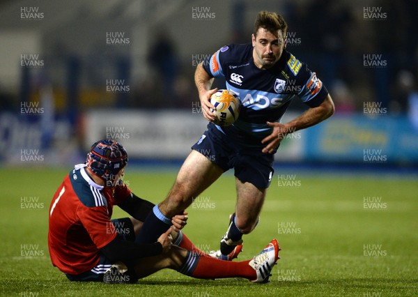 231113 - Cardiff Blues v Munster - RaboDirect PRO12 -Dafydd Hewitt of Cardiff Blues is tackled by Johne Murphy of Munster