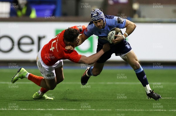 260221 - Cardiff Blues v Munster - Guinness PRO14 - Matthew Morgan of Cardiff Blues is tackled by Calvin Nash of Munster