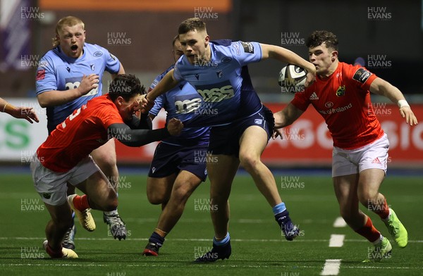 260221 - Cardiff Blues v Munster - Guinness PRO14 - Mason Grady of Cardiff Blues is tackled by Joey Carbery of Munster
