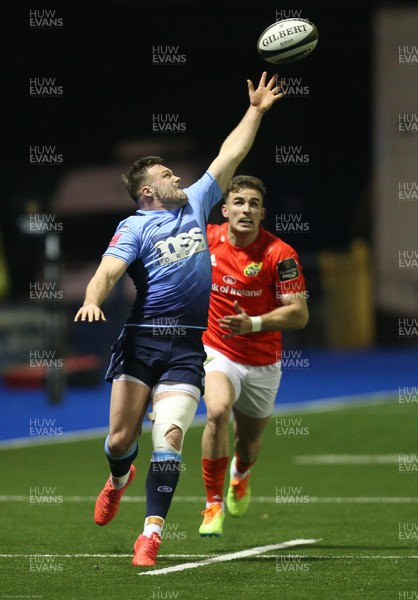 260221 - Cardiff Blues v Munster, Guinness PRO14 - The bounce of the ball beats Owen Lane of Cardiff Blues as he looks to claim the ball