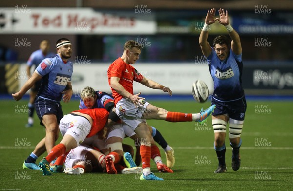 260221 - Cardiff Blues v Munster, Guinness PRO14 - Rory Thornton of Cardiff Blues looks to charge down the kick from Nick McCarthy of Munster