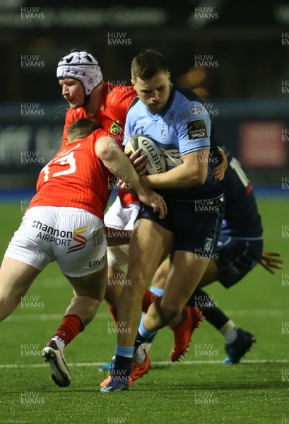 260221 - Cardiff Blues v Munster, Guinness PRO14 - Mason Grady of Cardiff Blues is tackled by Rory Scannell of Munster