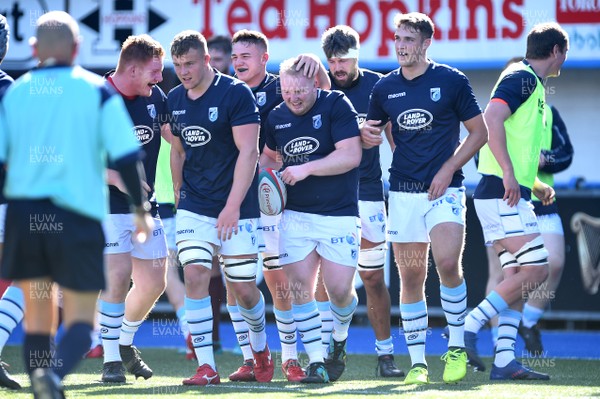 290918 - Cardiff Blues A v Munster A - Celtic Cup - Ethan Lewis of Cardiff Blues celebrates try with team mates