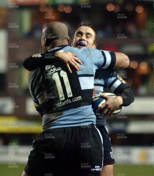 271205 - Cardiff Blues v Newport Gwent Dragons - Celtic League -  Blues' Jonah Lomu celebrates with his captain Rhys Williams