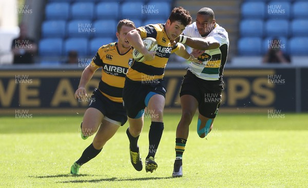 070816 - Singha Premiership Rugby 7s Series Final - Plate Semi Final - Cardiff Blues v  Northampton Saints - Owen Jenkins of Cardiff Blues is tackled by Yiannis Lozias of Northampton