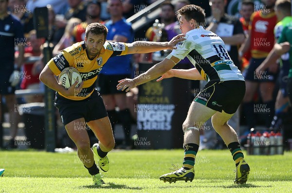 070816 - Singha Premiership Rugby 7s Series Final - Plate Semi Final - Cardiff Blues v  Northampton Saints - James Beale of Cardiff Blues is tackled by Will Edwards of Northampton