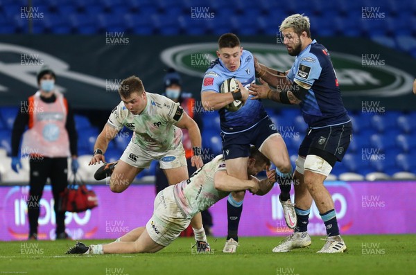 010121 - Cardiff Blues v Ospreys, Guinness PRO14 - Josh Adams of Cardiff Blues is tackled by Keiran Williams of Ospreys