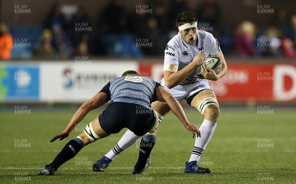 171117 - Cardiff Blues v Ospreys - Anglo Welsh Cup - Rory Thornton of Ospreys is tackled by Shane Lewis Hughes of Cardiff Blues