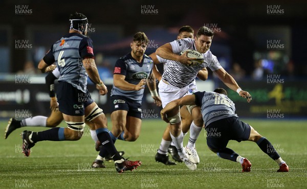 171117 - Cardiff Blues v Ospreys - Anglo Welsh Cup - Rob McCusker of Ospreys is tackled by Steven Shingler of Cardiff Blues