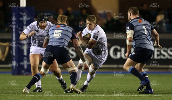 171117 - Cardiff Blues v Ospreys - Anglo Welsh Cup - Bradley Davies of Ospreys is tackled by Damian Welch of Cardiff Blues