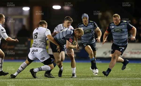 171117 - Cardiff Blues v Ospreys - Anglo Welsh Cup - Ethan Lewis of Cardiff Blues is tackled by Ales Jeffries of Ospreys