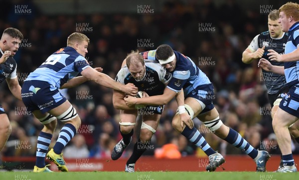 270419 - Cardiff Blues v Ospreys - Guinness PRO14 - Judgement Day - Alun Wyn Jones of Ospreys is tackled by Rory Thornton of Cardiff Blues