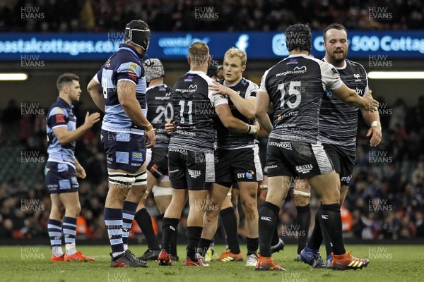 270419 - Cardiff Blues v Ospreys, Judgement Day VII, Guinness PRO14 - Ospreys players celebrate and Cardiff Blues players look dejected at the end of the match