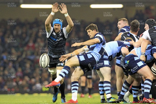 270419 - Cardiff Blues v Ospreys, Judgement Day VII, Guinness PRO14 - Lloyd Williams of Cardiff Blues kicks clear as Justin Tipuric  of Ospreys closes in