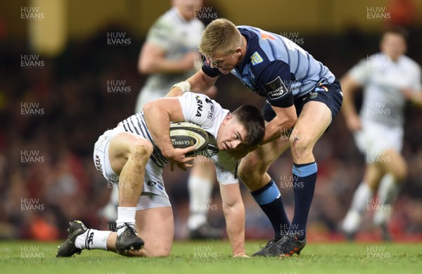 280418 - Cardiff Blues v Ospreys - Guinness PRO14 - Reuben Morgan-Williams of Ospreys is tackled by Gareth Anscombe of Cardiff Blues
