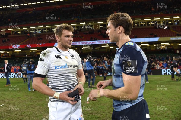 280418 - Cardiff Blues v Ospreys - Guinness PRO14 - Dan Biggar of Ospreys and Blaine Scully of Cardiff Blues at the end of the game
