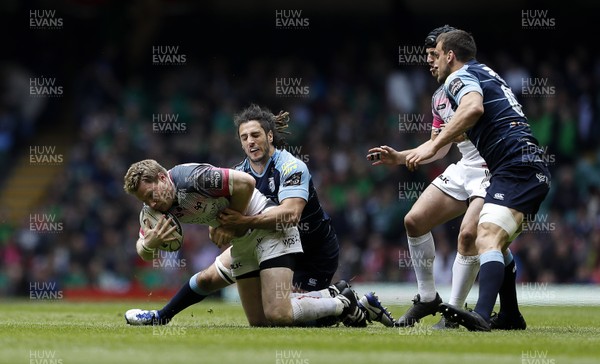 300416 - Cardiff Blues v Ospreys - Judgement Day - Guinness PRO12 - Jonathan Spratt of Ospreys is tackled by Josh Navidi of Cardiff Blues