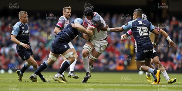 300416 - Cardiff Blues v Ospreys - Judgement Day - Guinness PRO12 - Adam Beard of Ospreys is tackled by James Down and Rey Lee-Lo of Cardiff Blues