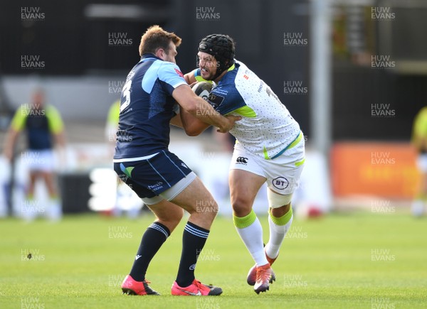 300820 - Cardiff Blues v Ospreys - Guinness PRO14 - Dan Evans of Ospreys is tackled by Garyn Smith of Cardiff Blues