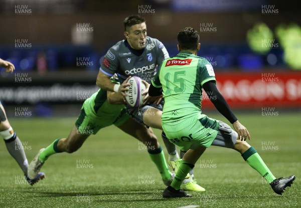 071219 - Cardiff Blues v Pau, European Challenge Cup - Josh Adams of Cardiff Blues looks to offload as he takes on Charly Malie of Pau