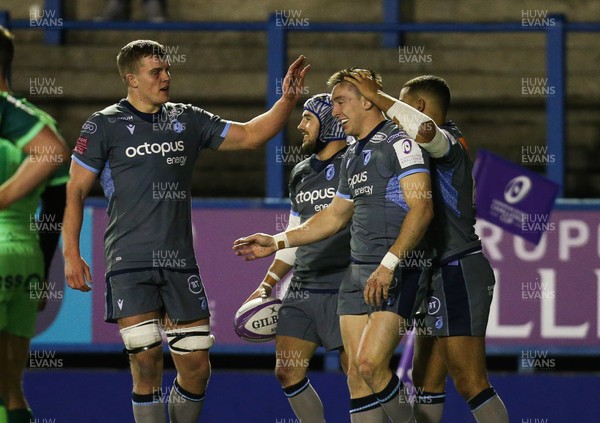 071219 - Cardiff Blues v Pau, European Challenge Cup - Josh Adams of Cardiff Blues is congratulated by team mates after scoring his second try