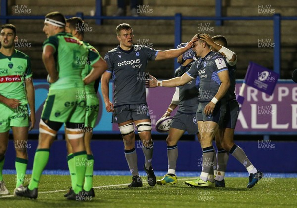 071219 - Cardiff Blues v Pau, European Challenge Cup - Josh Adams of Cardiff Blues is congratulated by team mates after scoring his second try