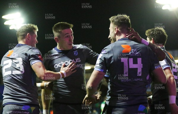 071219 - Cardiff Blues v Pau, European Challenge Cup - Owen Lane of Cardiff Blues, 14, is congratulated by Hallam Amos, Josh Adams and Rey Lee-Lo after scoring try