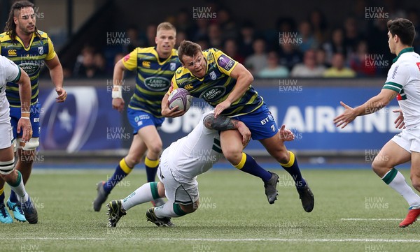 210418 - Cardiff Blues v Pau - European Rugby Challenge Cup Semi Final - Jarrod Evans of Cardiff Blues is tackled by Thomas Domingo of Pau
