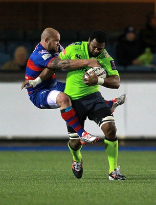 160115 - Cardiff Blues v Rovigo - European Rugby Challenge Cup - Manoa Vosawai of Cardiff Blues smashes past Joe Van Niekerk of Rovigo