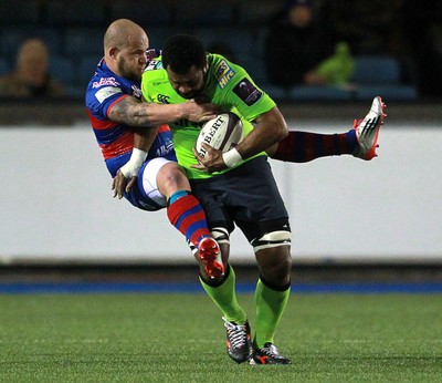 160115 - Cardiff Blues v Rovigo - European Rugby Challenge Cup - Manoa Vosawai of Cardiff Blues smashes past Joe Van Niekerk of Rovigo