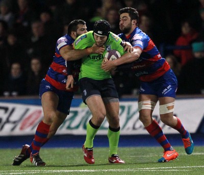 160115 - Cardiff Blues v Rovigo - European Rugby Challenge Cup - Adam Thomas of Cardiff Blues is tackled by Nicola Quaglia and Emiliano Caffini of Rovigo